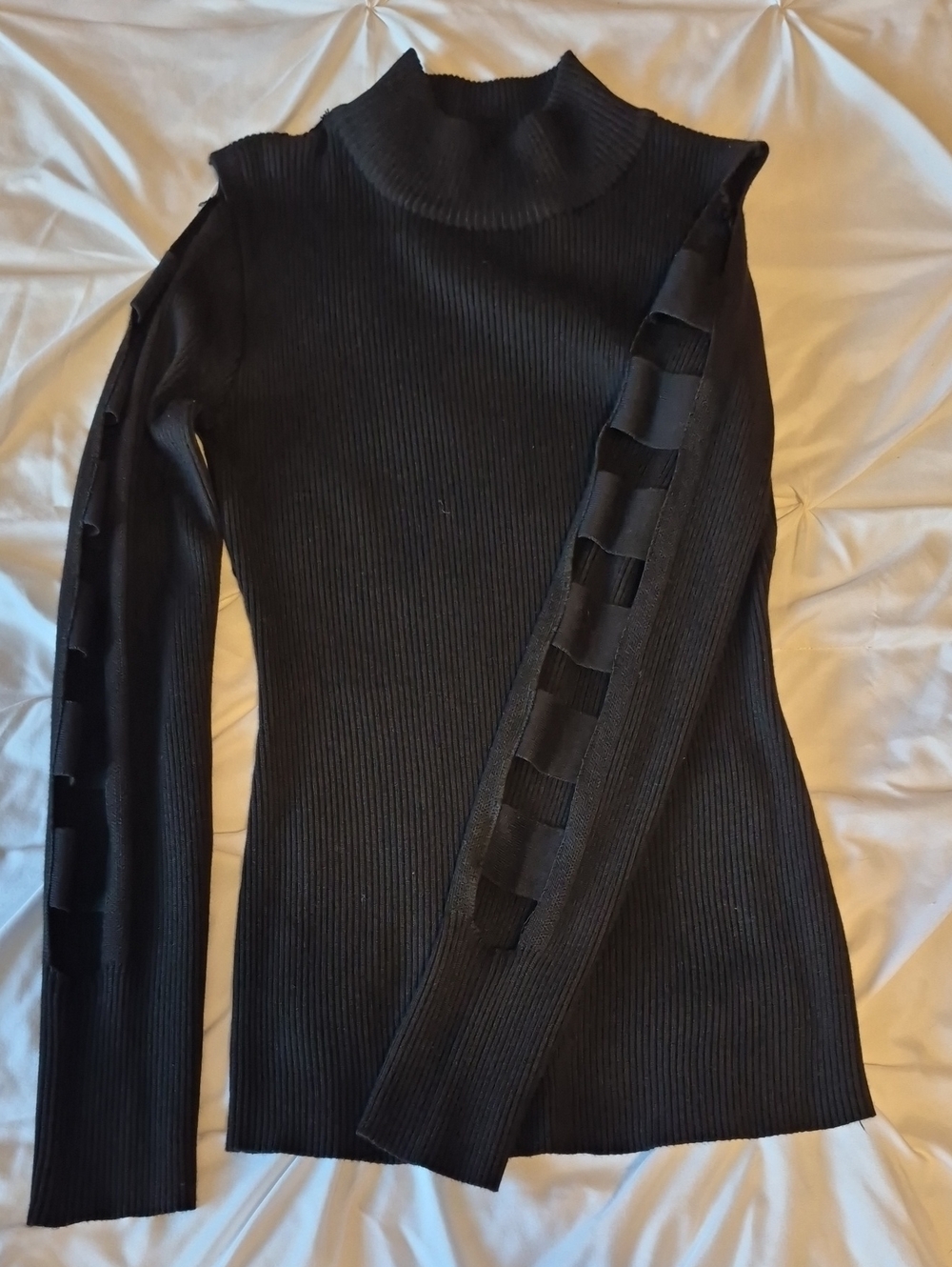 Almost Famous Black Ribbed Turtleneck Sweater with Ribbon-Cut Sleeve Detail